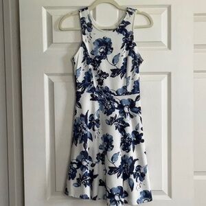 Women’s white blue flowered slip on dress. Med but runs small